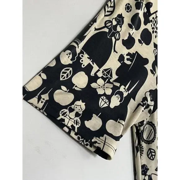 LuLaRoe Black and Cream Disney Patterned Tunic Top - Picture 2 of 5
